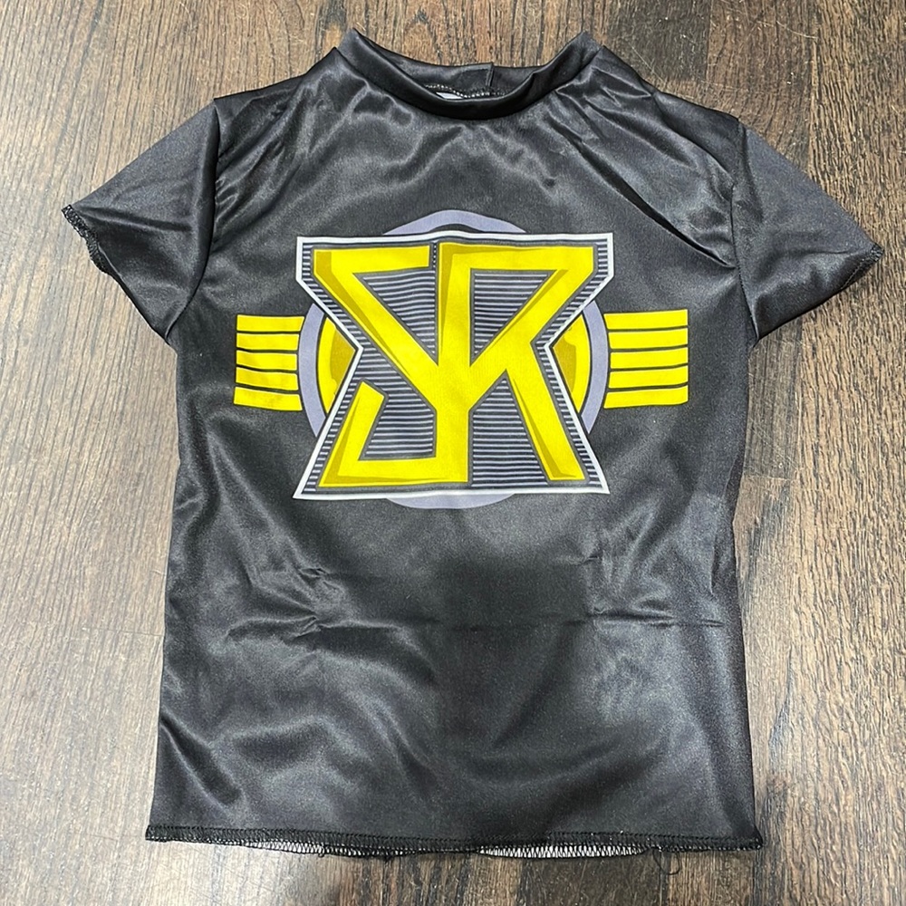Unused WWE Seth Rollins costume shirt. Fits size 4-6x. Velcro closure in back.